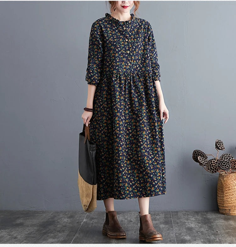Tidløs vintage blomsterkjole for kvinner, med elegante volanger og lange ermer for en bohemsk stil.
