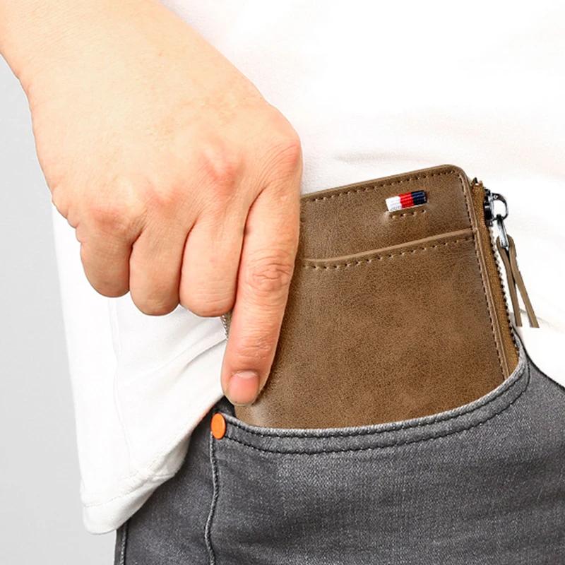 "Vintage skinn RFID-lommebok for menn i brun, svart eller kaki. Sikker og stilig med rom for 14 kort og kontanter."