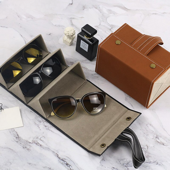 Sammenleggbart brilleetui i vintage skinn med trykknapp, ideelt for reiseoppbevaring